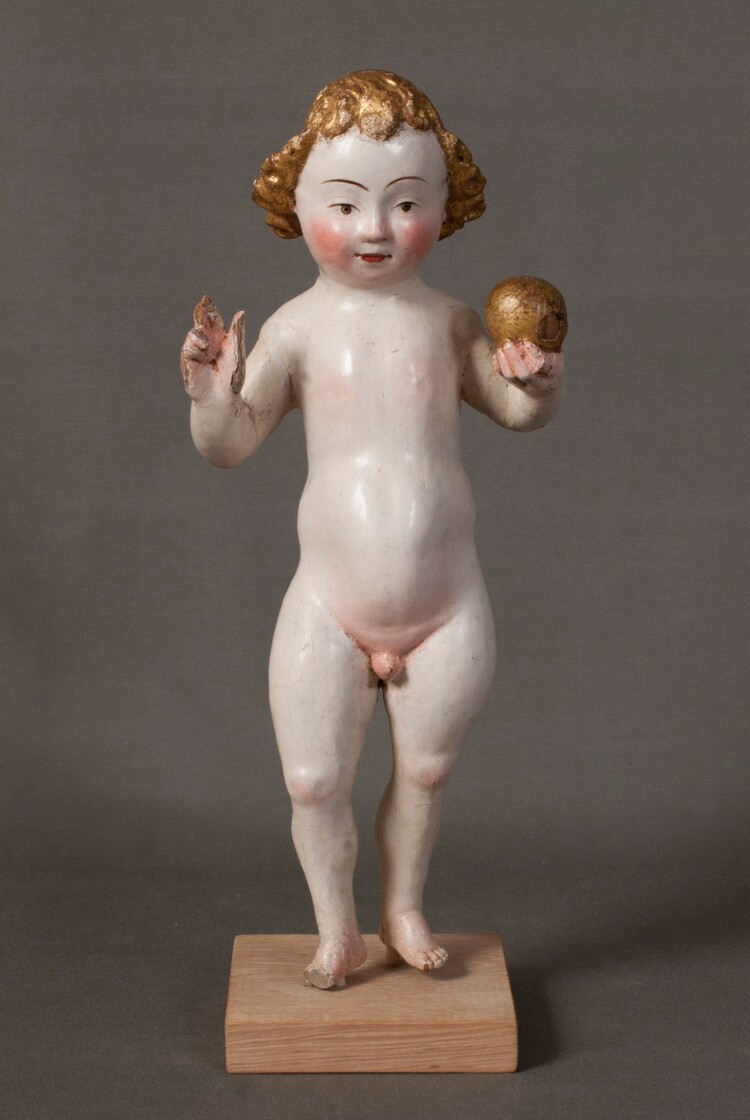 Blessing Christ Child holding a globe, 16th century, polychromed wood, Mechels popje from the collection of Museum Hof van Busleyden in Mechelen.
